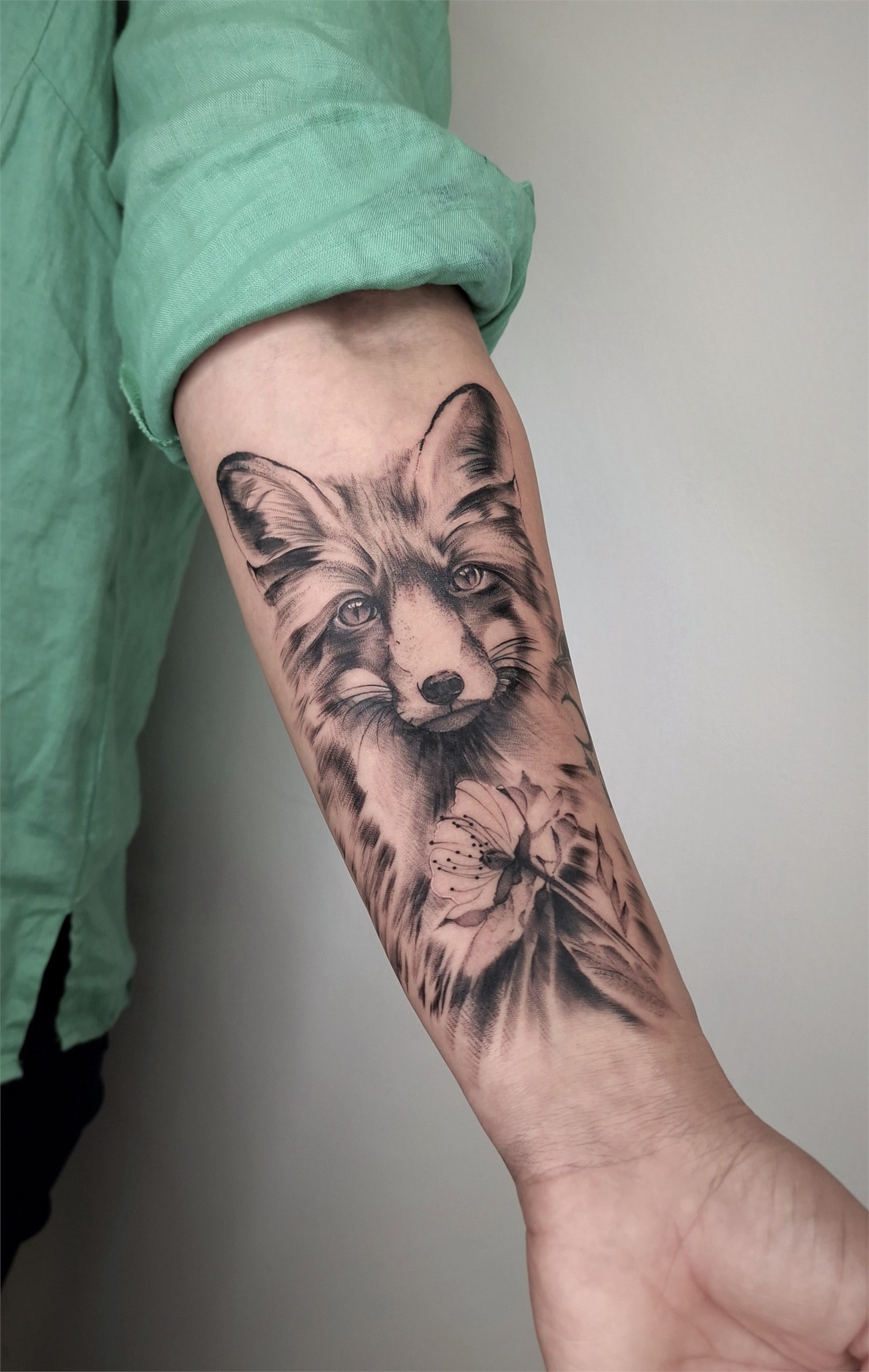 Fox portrait tattoo on the arm by Gruntins Tattoo in Liepāja